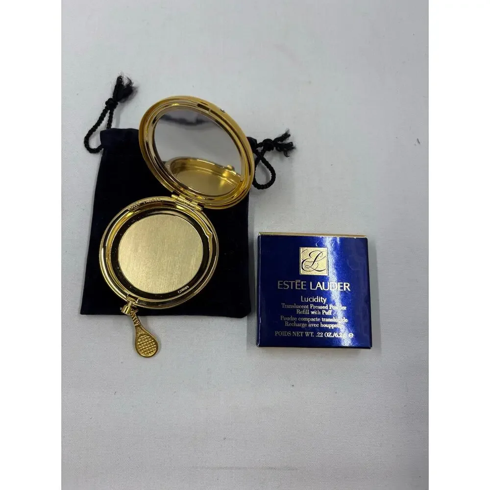 Vtg Estée Lauder Gold Tennis Ball Compact w/ Charm and New powder insert